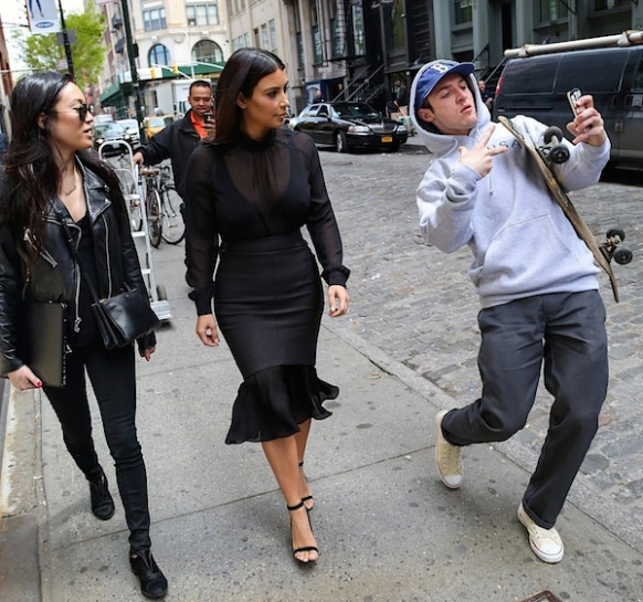 guy taking selfie with Kim Kardashian